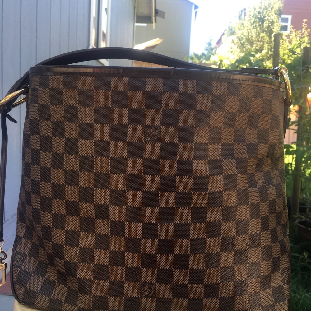 Used good condition Lious Vuitton delight pm bag.
